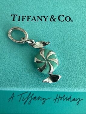 🩵 Tiffany & Co. Bon Bon Candy
Charm in Blue Enamel and
Sterling Silver